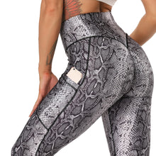 Load image into Gallery viewer, Versant™ Animal Print Yoga Pants
